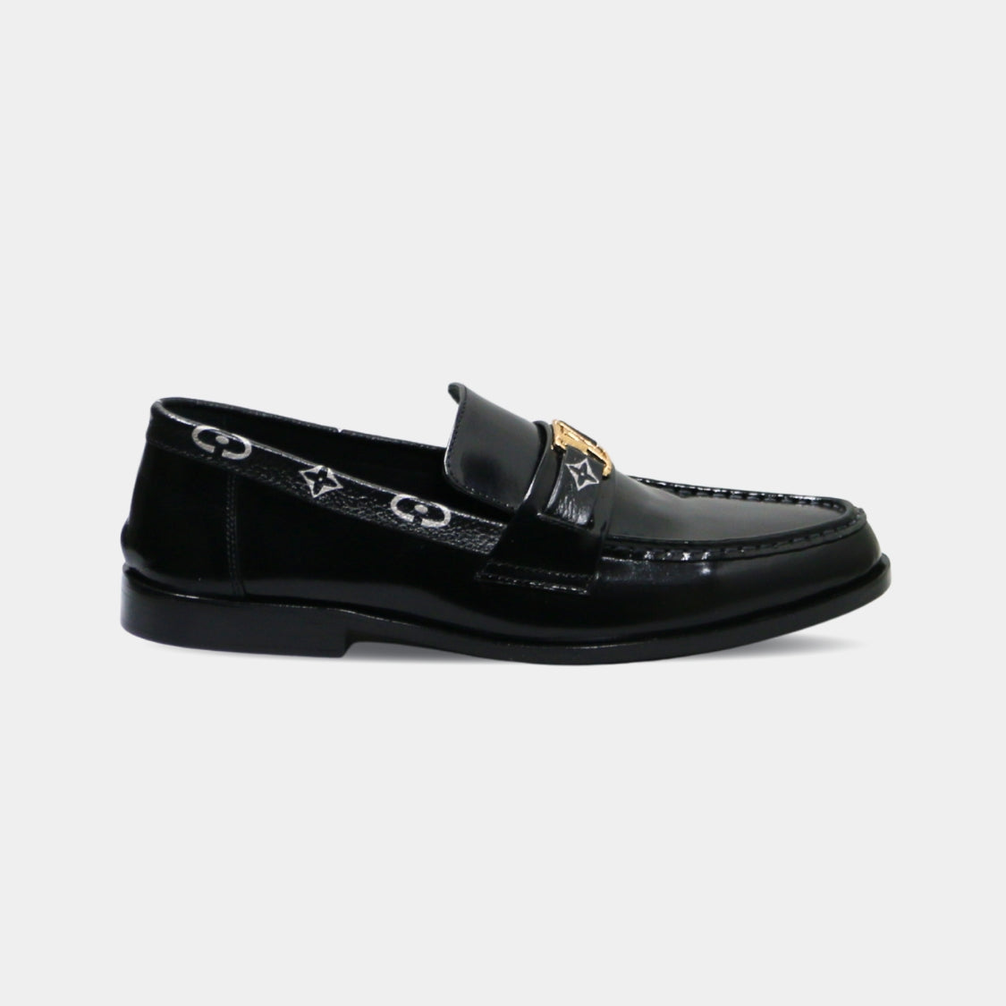 ARQS.PK 727 black leather loafers featuring a gold-tone metal bit and patterned side detailing.