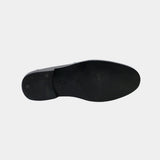 ARQS.PK 727 black dress shoe sole showing a smooth finish and low heel for everyday comfort and durability