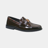 ARQS.PK 727 dark brown patent leather loafers with gold-tone metal hardware and embossed side detailing.