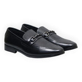 ARQS.PK black leather formal loafers featuring a textured vamp panel and elegant metal bit detail on a white background