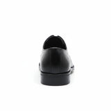 ARQS.PK black leather formal derby shoe viewed from the back showing the low-profile heel and smooth construction.