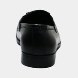 Rear view of ARQS.PK black leather horsebit loafers showing the smooth heel and sturdy sole construction.
