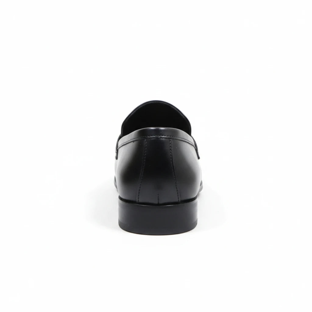 ARQS.PK black formal leather loafer shoe viewed from the back showing the smooth finish and low heel