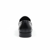 ARQS.PK black formal leather loafer shoe viewed from the back showing the smooth finish and low heel