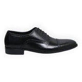 ARQS.PK 873N black leather oxford dress shoe with cap toe and brogue detailing in a side profile view