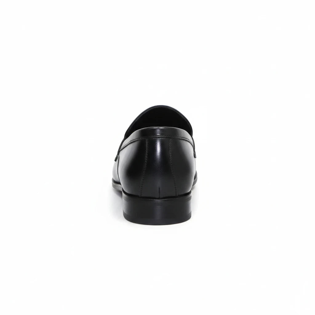 ARQS.PK black leather penny loafer dress shoe viewed from the back showing a polished finish and low heel