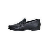 ARQS.PK black leather penny loafer dress shoe with a stitched apron toe and classic saddle strap detail.