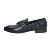 ARQS.PK black leather tassel loafer dress shoe with apron-toe design in a side profile view.