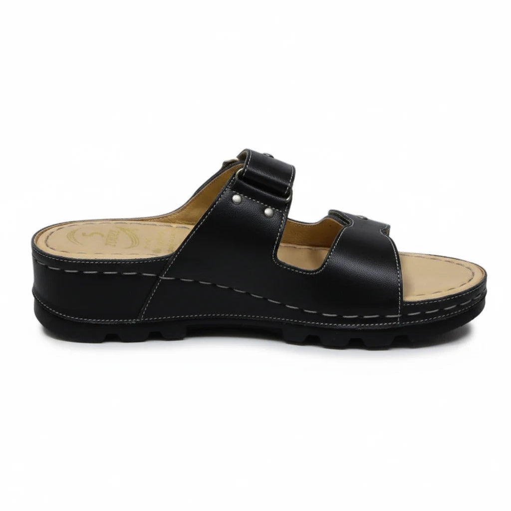 ARQS.PK black dual-strap platform slide sandals with metallic stud accents, contrast stitching, and ergonomic footbed.