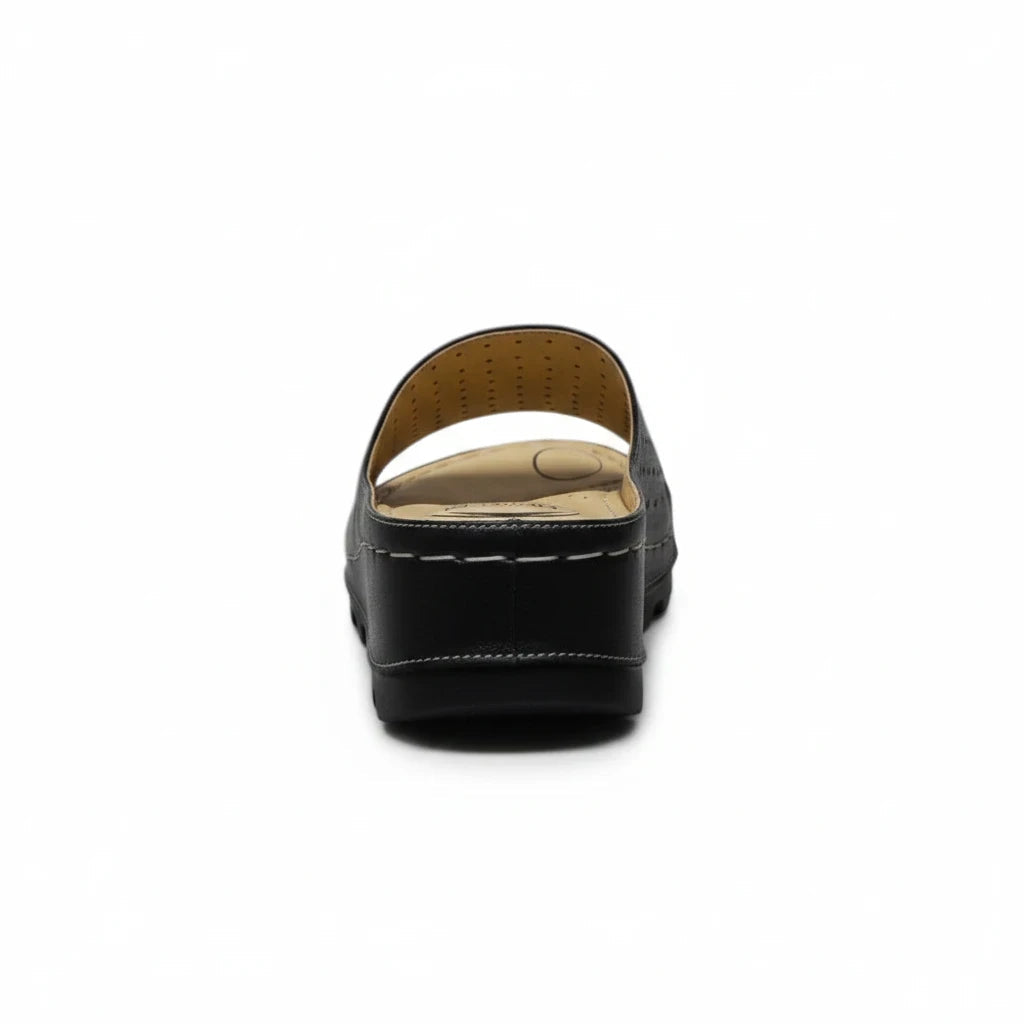 ARQS.PK Dr Mauch reflexology slippers in black with therapeutic acupressure footbed and white contrast stitching