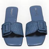 ARQS.PK blue slide sandals featuring a woven texture strap and decorative buckle detail on a square toe base.
