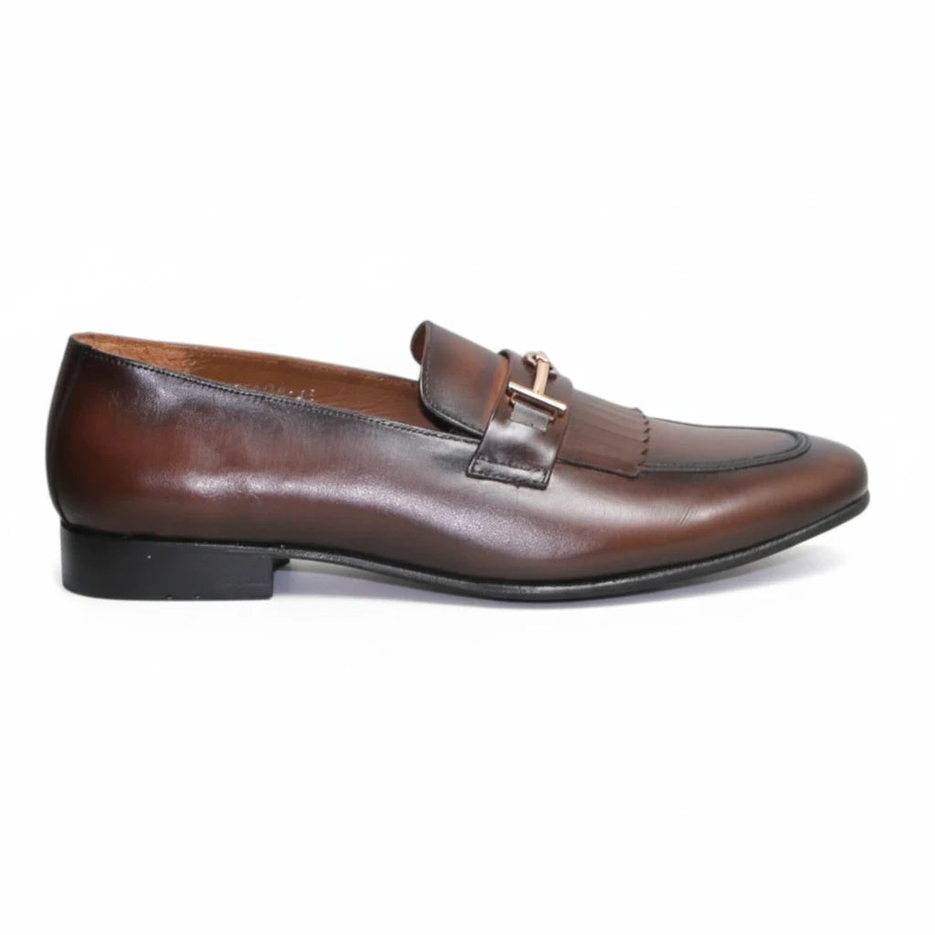 ARQS.PK 1708 brown leather loafers with fringe detail and gold-tone metal hardware on a white background