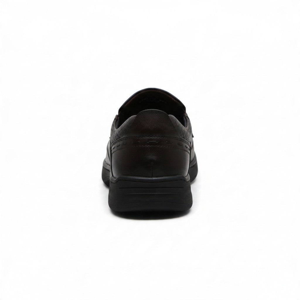 ARQS.PK brown synthetic leather slip-on loafer viewed from the back, showing the heel and durable rubber outsole.