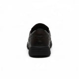 ARQS.PK brown synthetic leather slip-on loafer viewed from the back, showing the heel and durable rubber outsole.