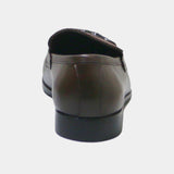 Rear view of ARQS.PK brown leather horsebit loafers showing the smooth heel and durable black outsole.
