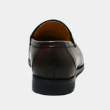 ARQS.PK brown leather penny loafer dress shoe viewed from the back showing the heel and smooth leather construction.