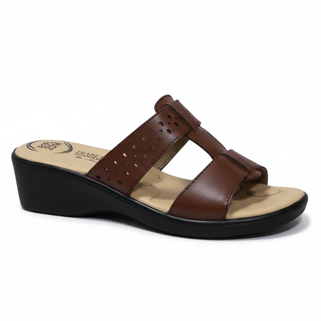 ARQS.PK brown leather wedge slide sandals with laser-cut strap detailing and a cushioned footbed.