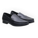 ARQS.PK men's classic slip-on loafers in dark textured leather with apron stitching and a durable low-profile sole.