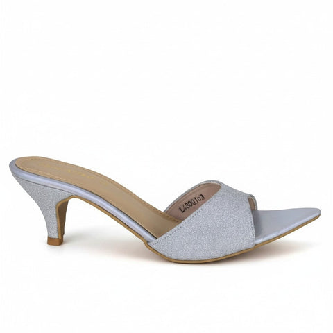 ARQS.PK silver glitter kitten heel mule with a pointed toe and synthetic upper on a white background