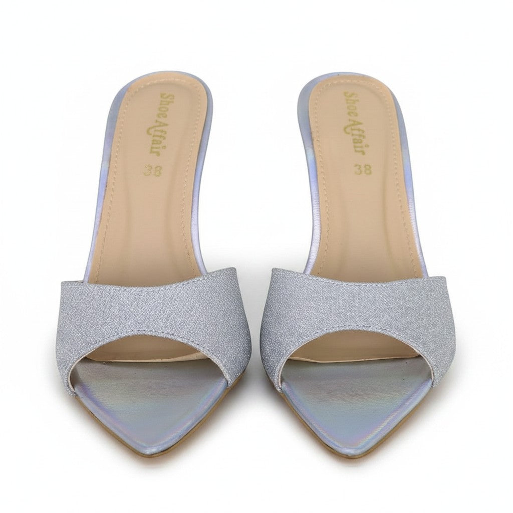 ARQS.PK silver glitter open-toe mule heels with a pointed toe and synthetic upper on a white background