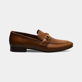 ARQS.PK tan leather horsebit loafers with gold-tone hardware in a classic slip-on silhouette