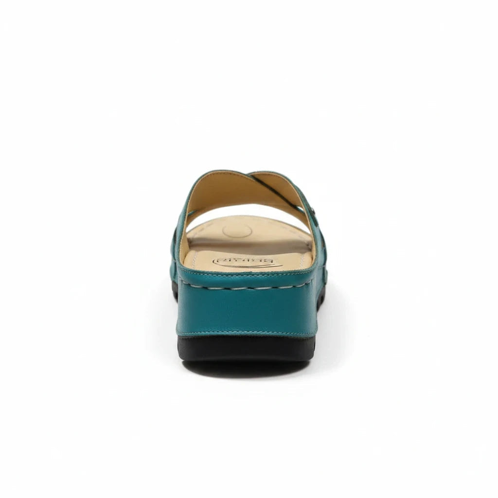 ARQS.PK teal orthopedic slide sandals with a cushioned footbed and platform sole, viewed from the back.