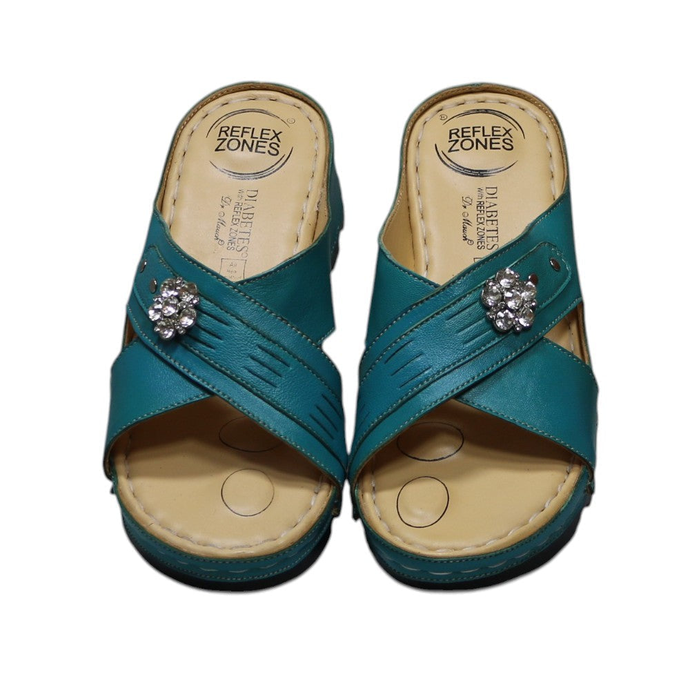 ARQS.PK teal orthopedic slide sandals with crisscross straps, crystal embellishments, and a cushioned footbed.